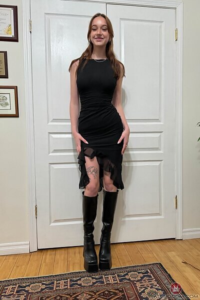 Melanie Marie in a fancy black dress from ATK Galleria